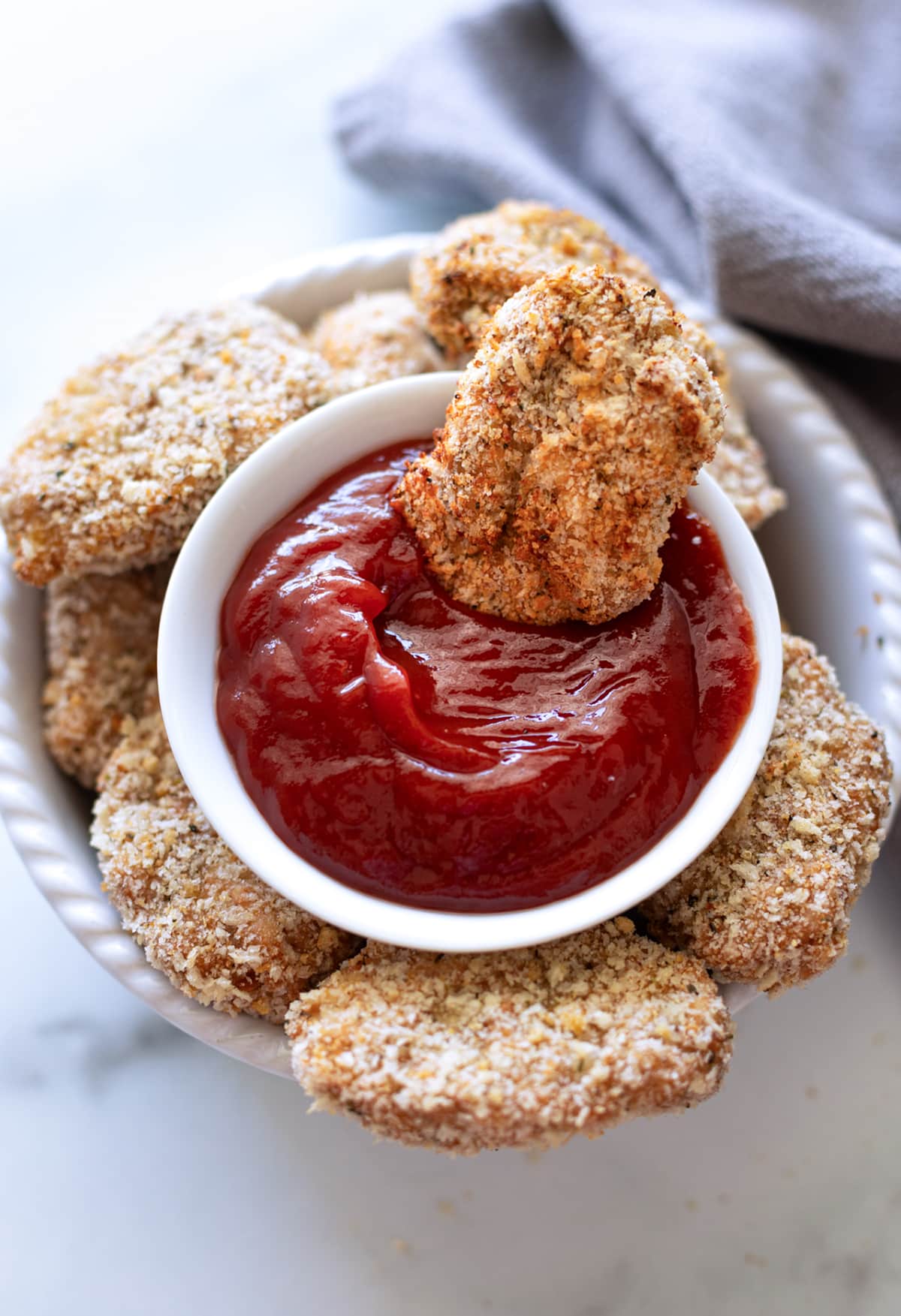 Turkey tot in a bowl of ketchup. 
