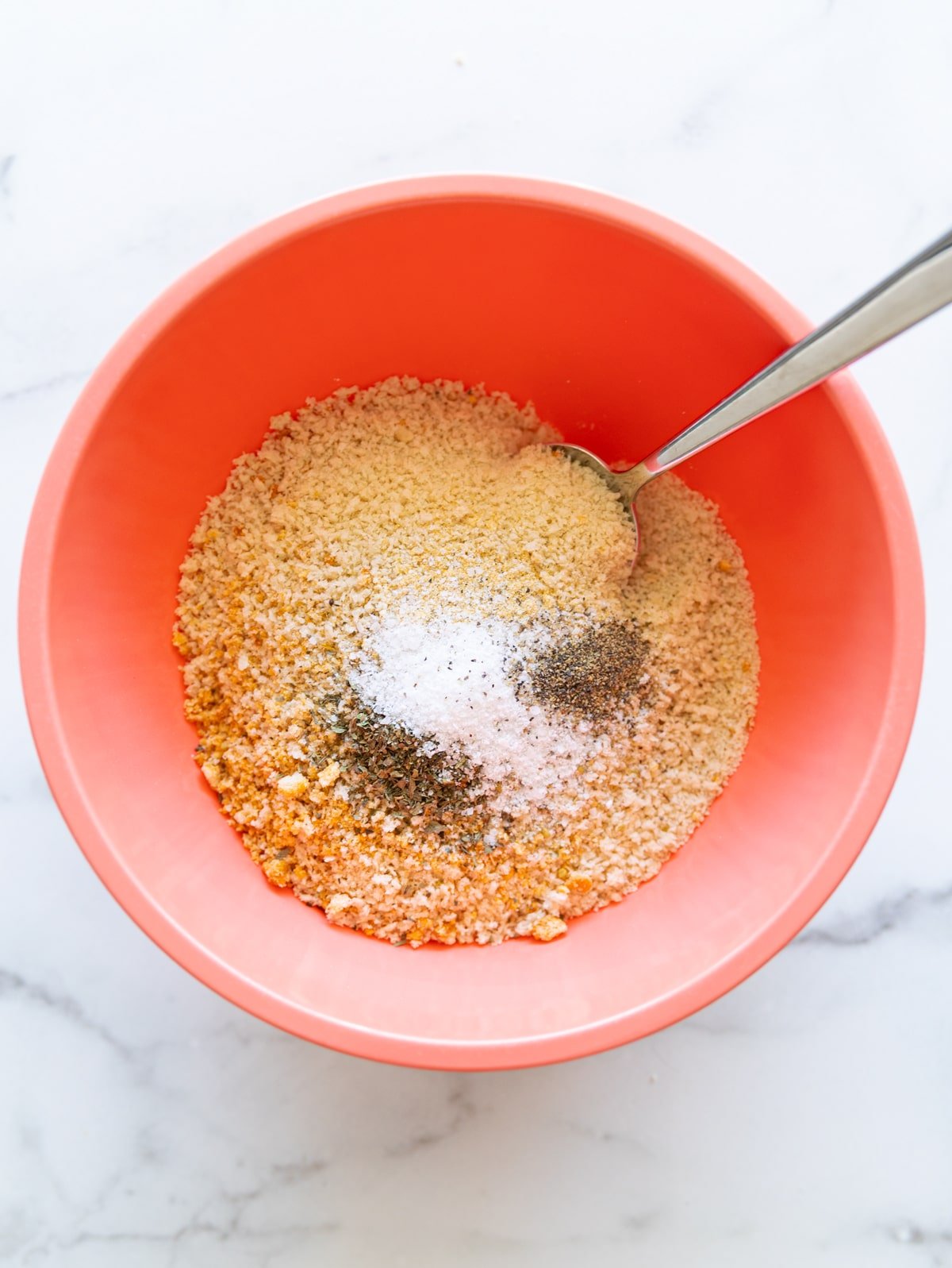 Bowl containing breadcrumb mixture.