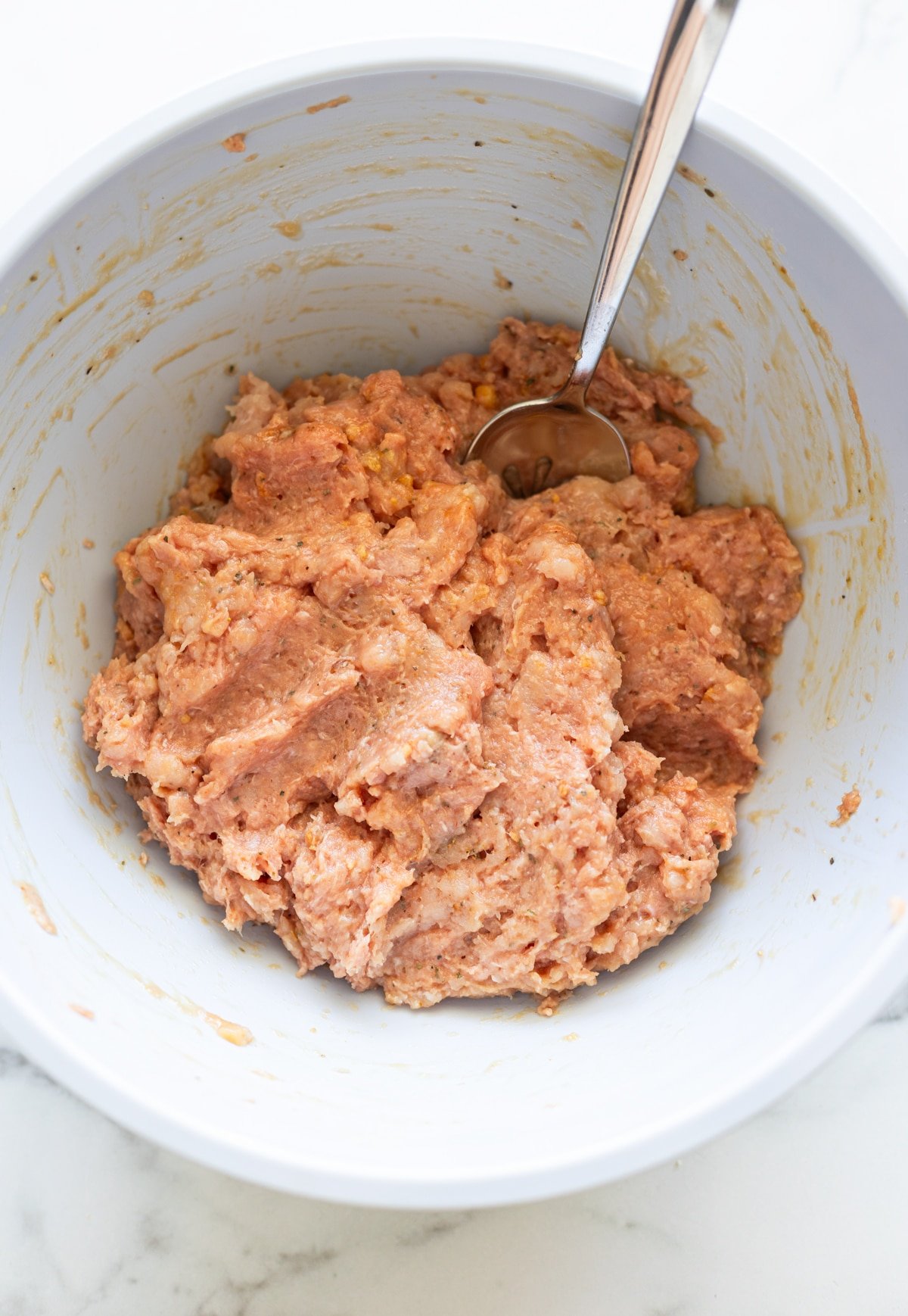 Raw turkey tot mixture in a bowl.