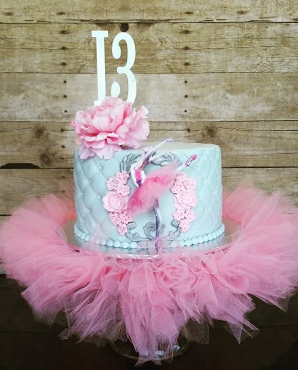 Blue and pink 13th birthday Ballerina birthday cake with pink tutu.