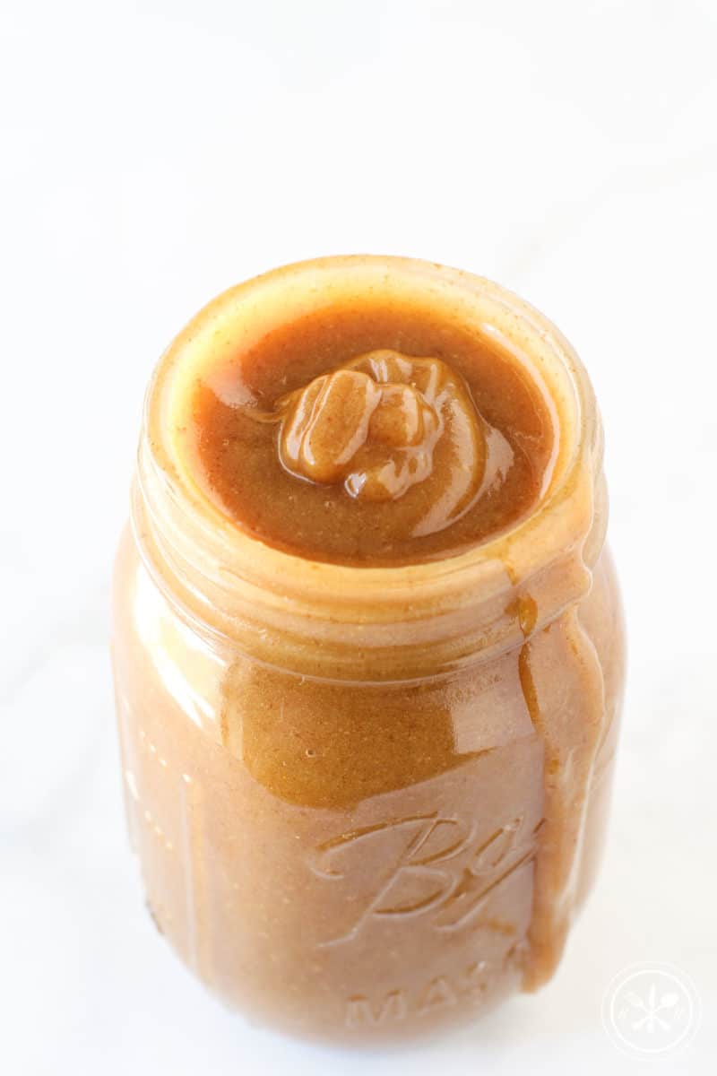 3 Ingredient Date Caramel Sauce in a Mason glass jar.