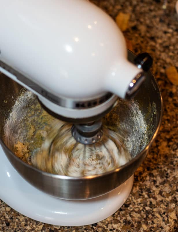 KitchenAid mixer mixing ingredients to make Churro Cinnamon Pumpkin Cookies.