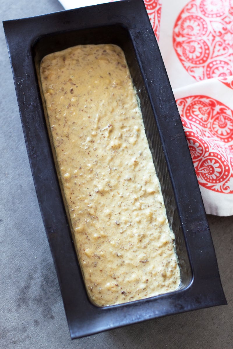 Batter in a loaf pan for making bread.