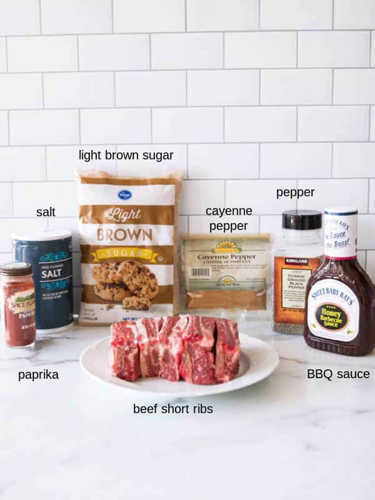 Ingredients to make beef short ribs on a counter. 