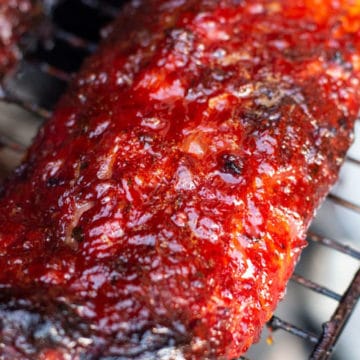 Slab of bbq ribs on the smoker.