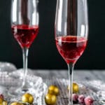 Two flutes with the mint-cranberry simple syrup and Chambord.