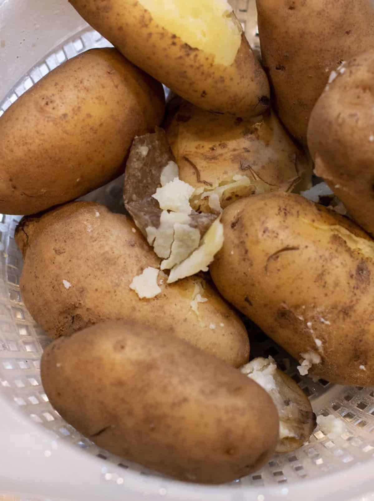 Cooked Idaho Potatoes ready to be peeled.