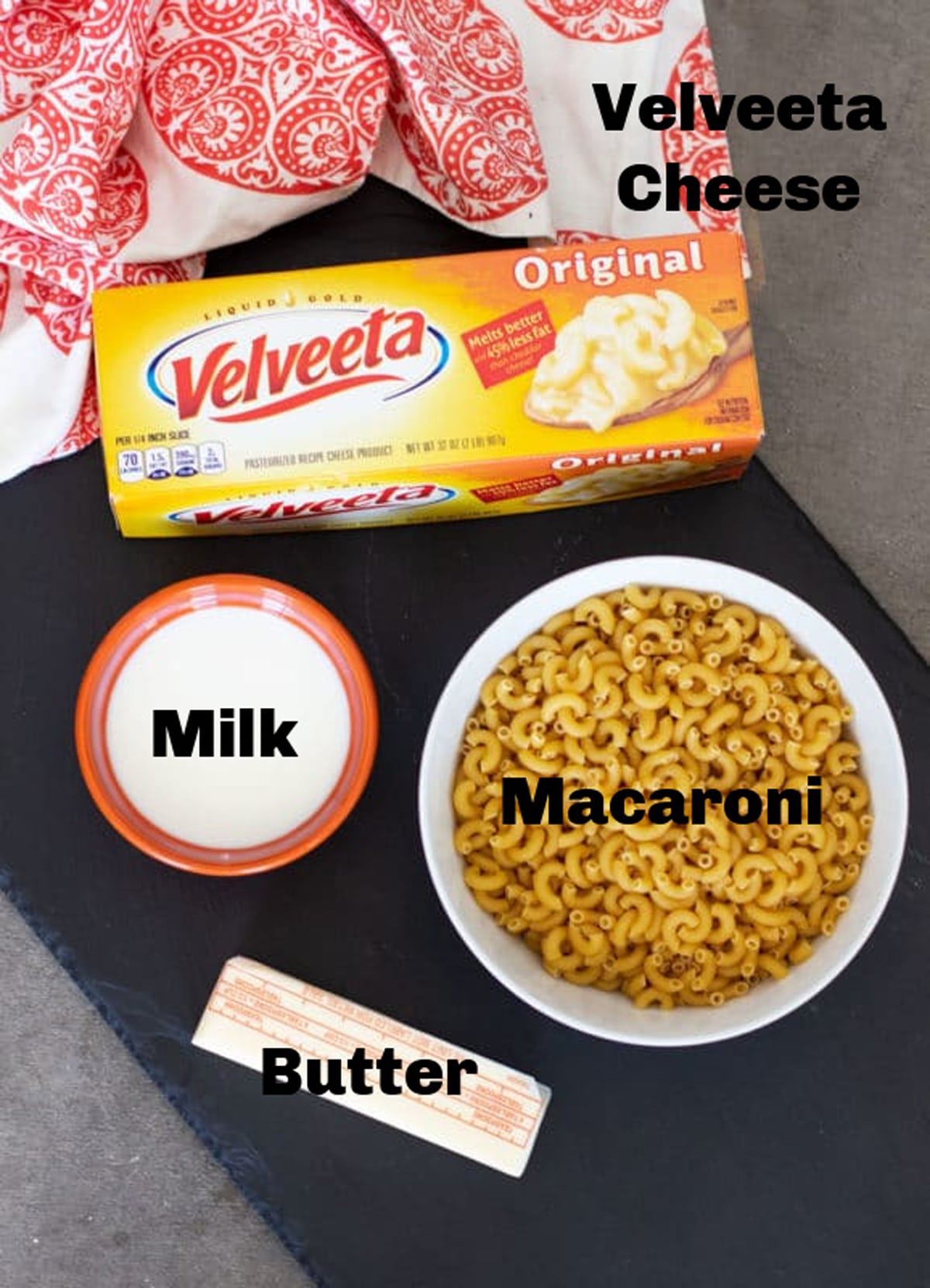 Velveeta Cheese,  Milk, and Macaroni.