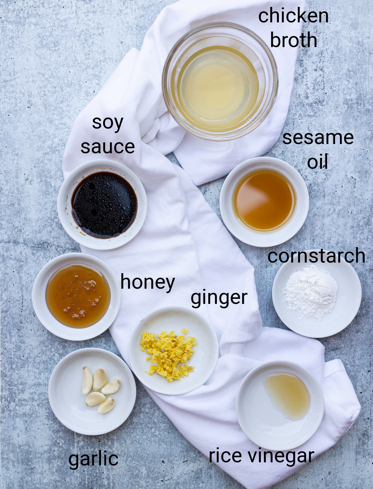 Ingredients on a counter to make honey garlic sauce for chicken. 