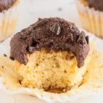 Vanilla cupcake keto recipe topped with chocolate icing.