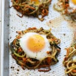 Spiralized vegetables topped with an egg.