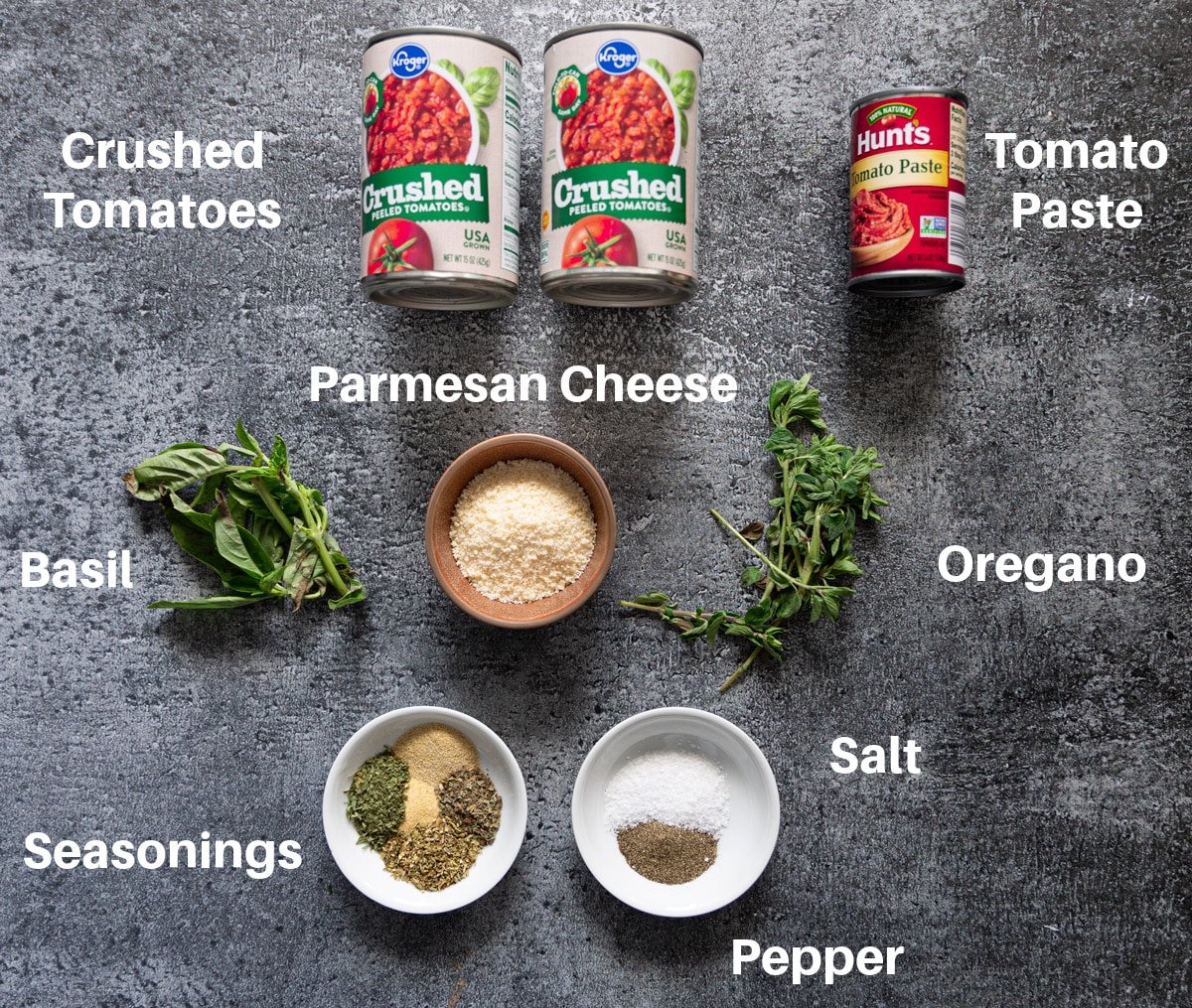 Ingredients on a counter to make homemade marinara sauce. 
