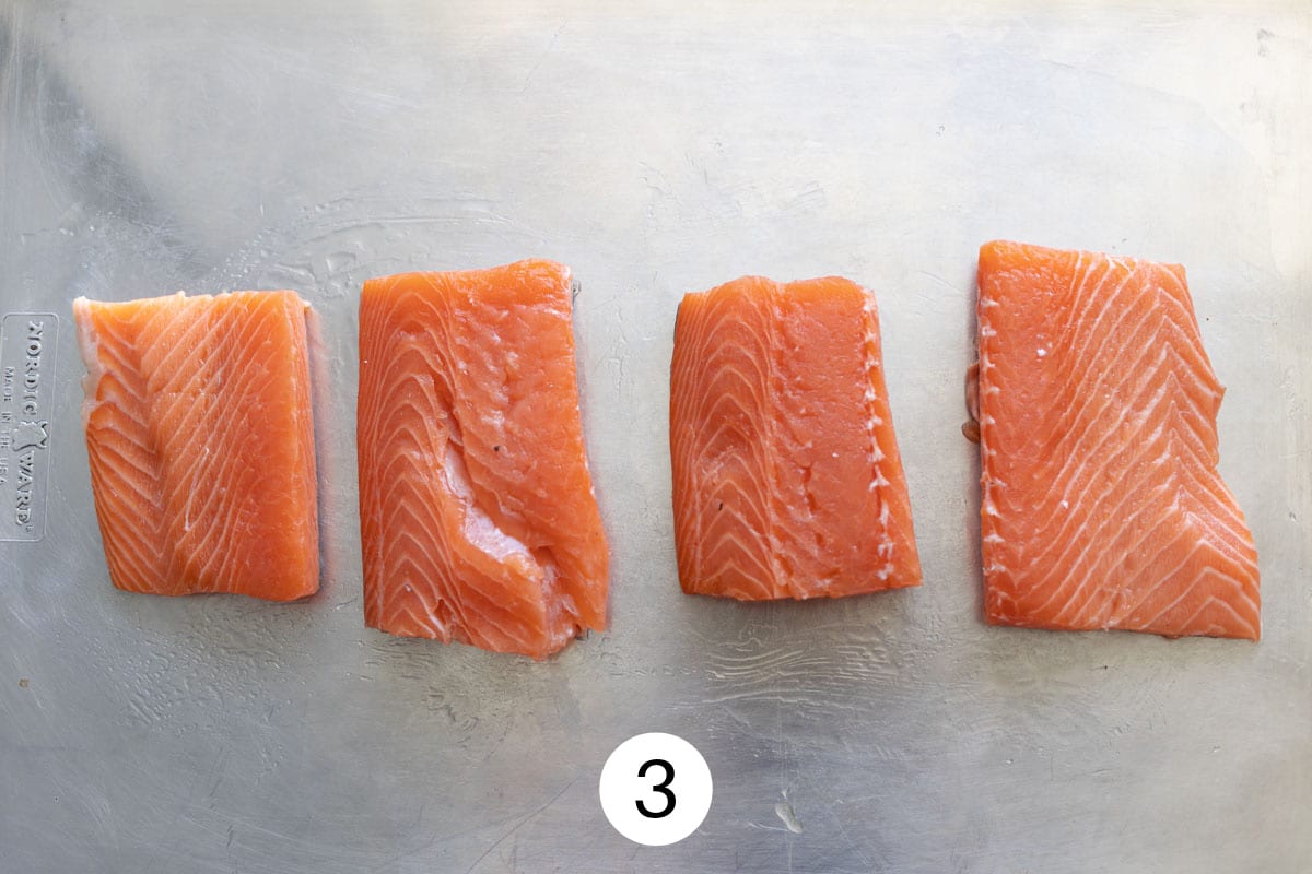 Step three: laying salmon on the sheet pan. 