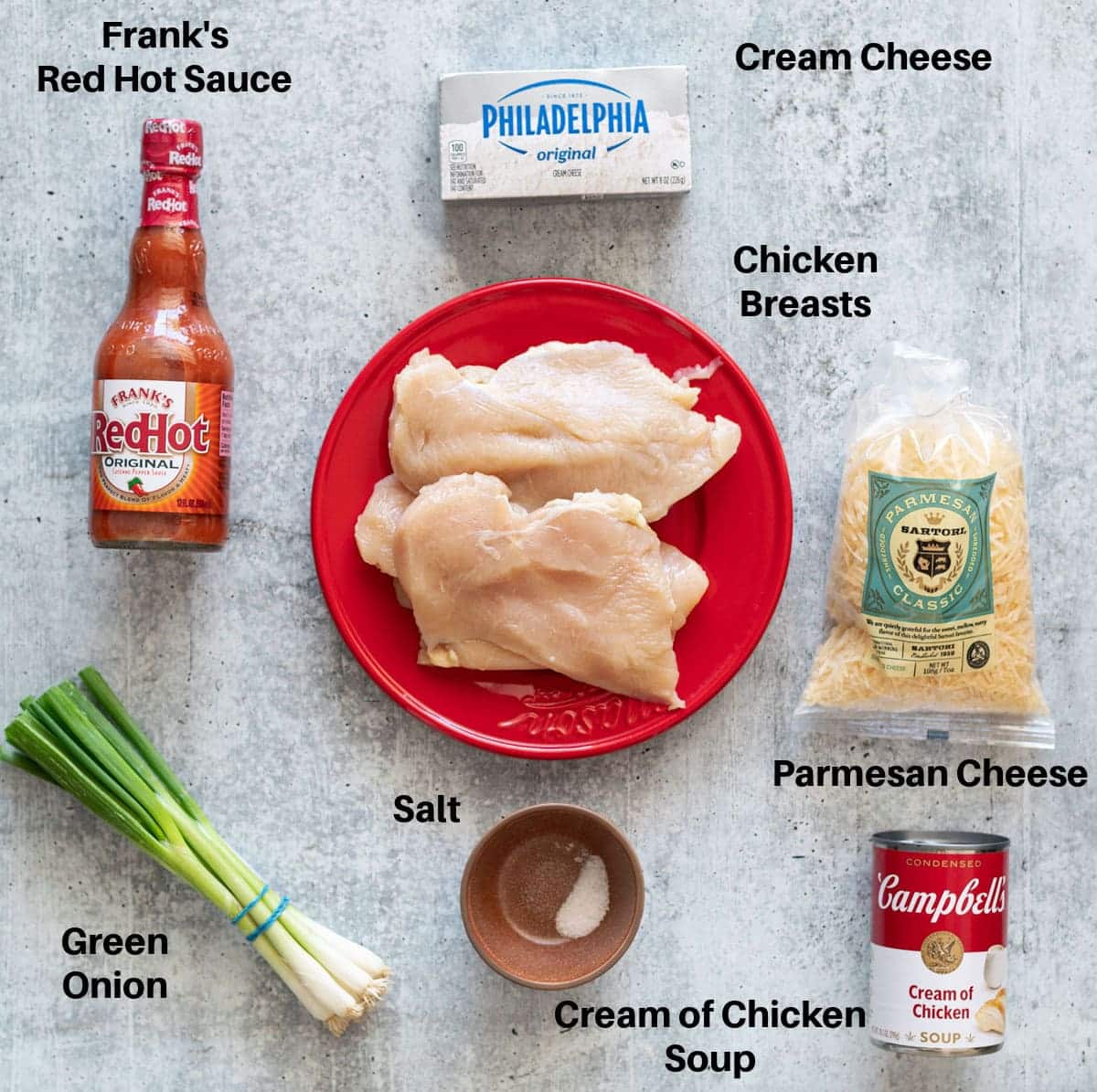 Ingredients on a counter to make a crock pot buffalo chicken dip. 