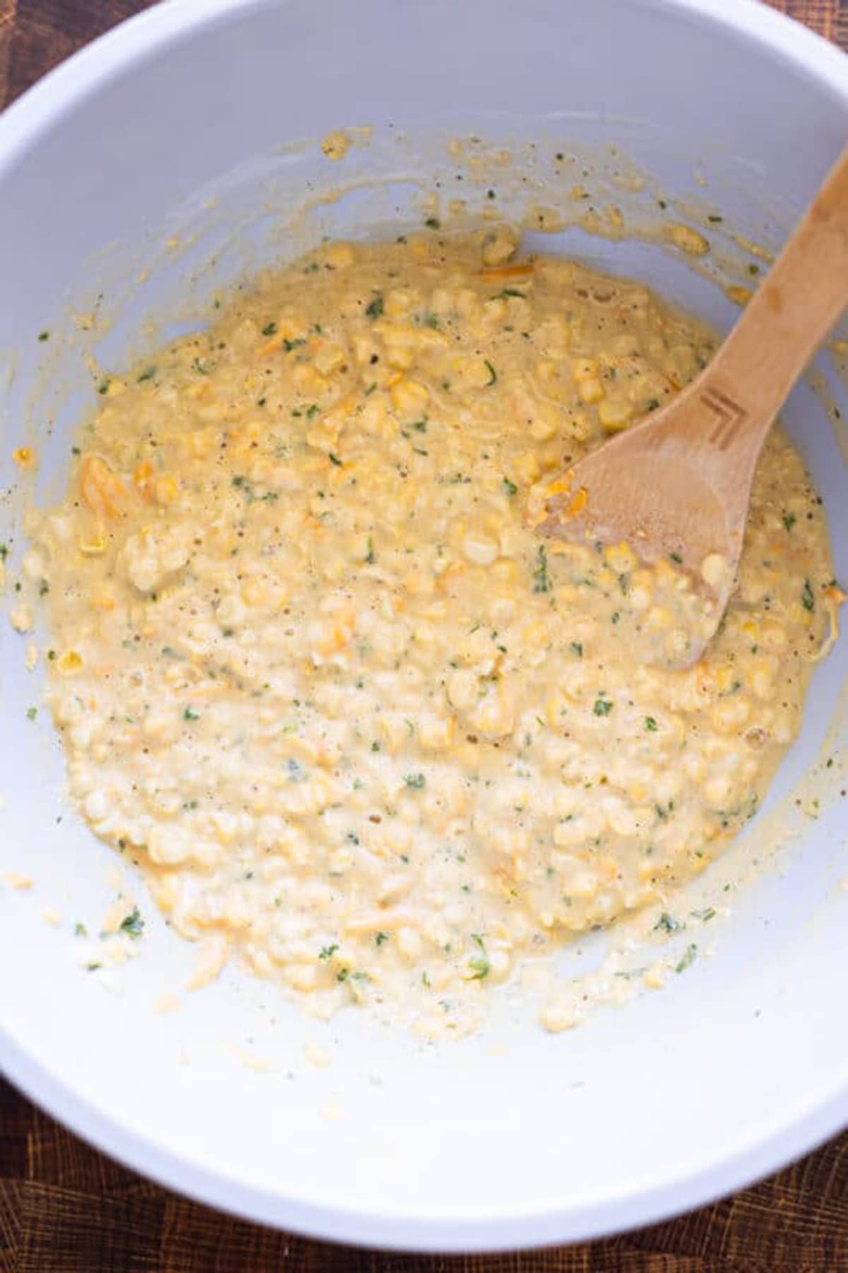 Corn fritter mixture in a bowl.