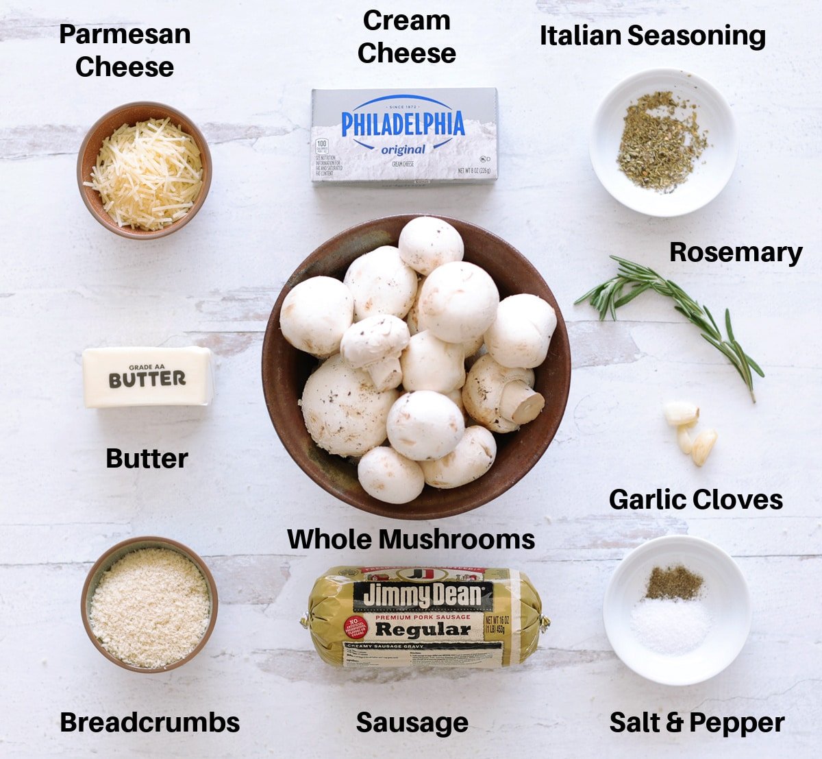 Ingredients on a counter to make sausage stuffed mushrooms.