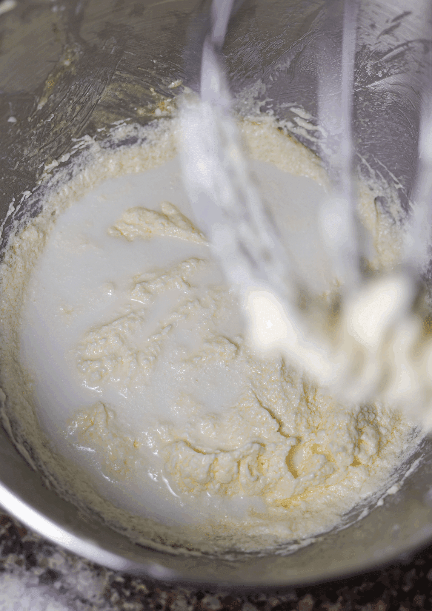 Whisking cookie batter in a mixing bowl. 