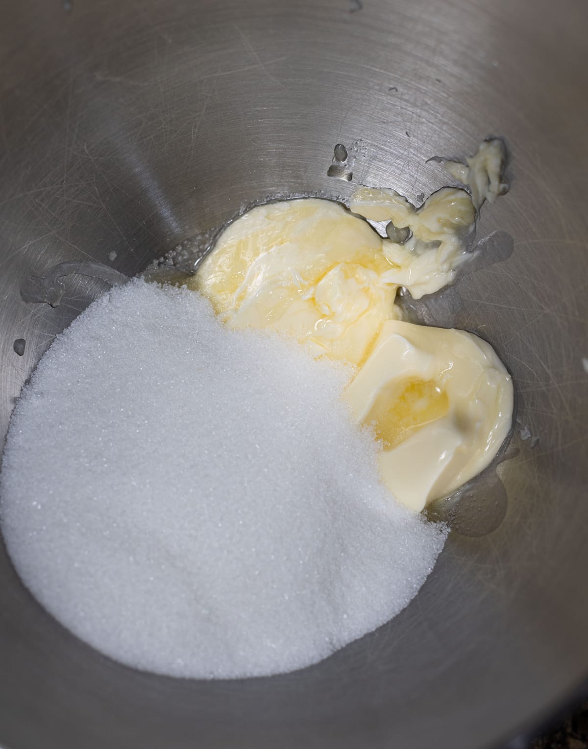 Sugar and butter being mixed together. 