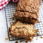 Apple Cinnamon Bread sliced on a cooling rack.