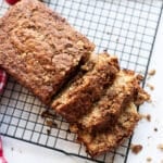 Cooling apple cinnamon bread on a cooling rack.