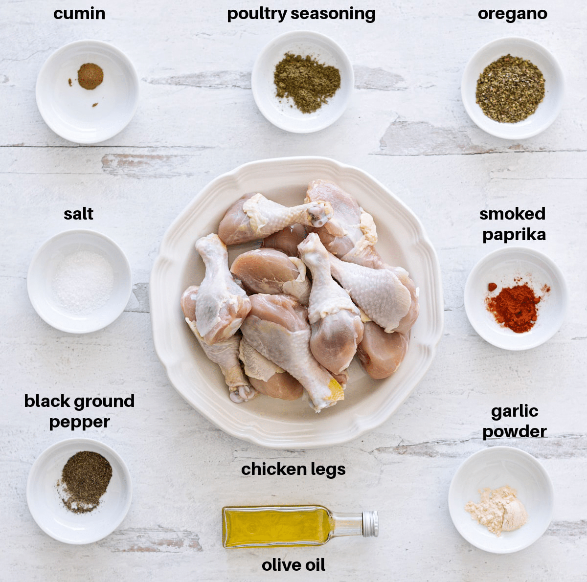 Counter filled with ingredients to bake drumsticks.