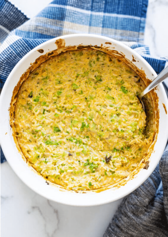 Cooked broccoli and rice casserole in a dish.